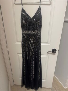 MARINA Black Dress with Label Detail